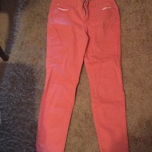 Bright peach colored jeans